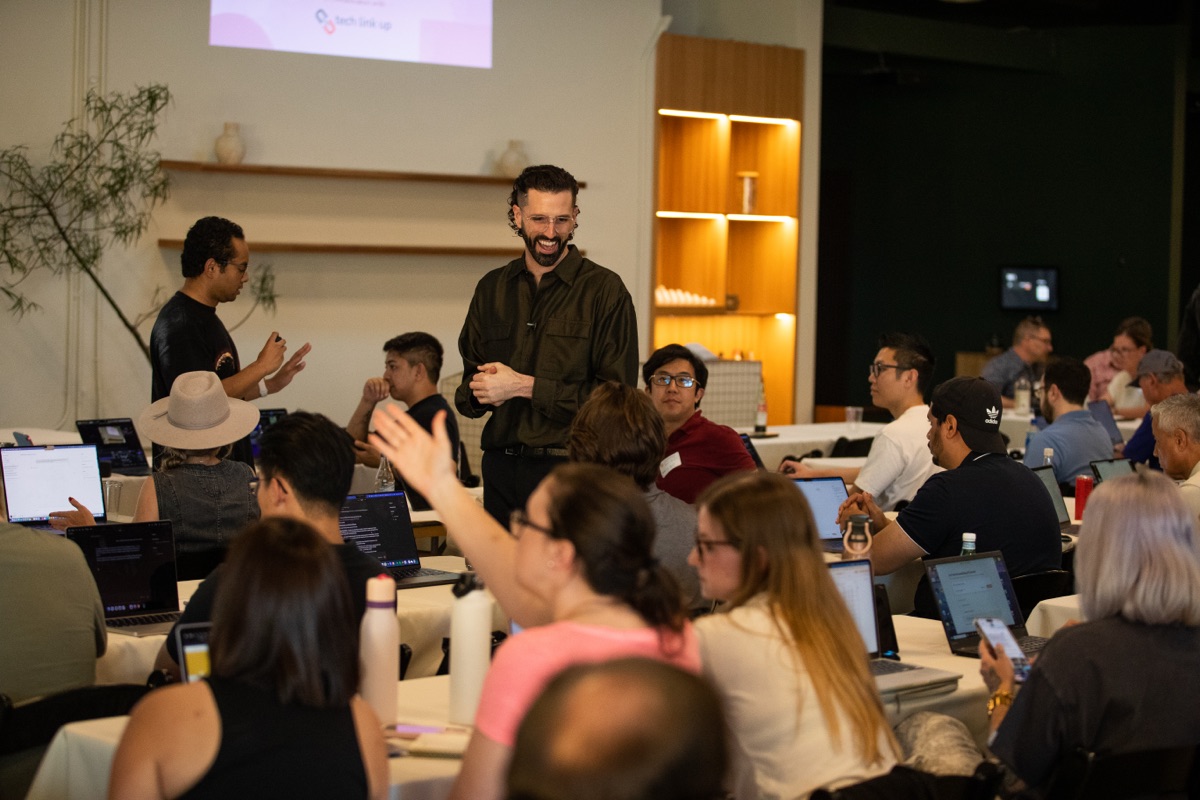 Travis engaging with attendees
